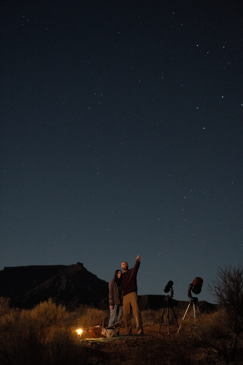 Man and woman under the stars in Greater Zion.