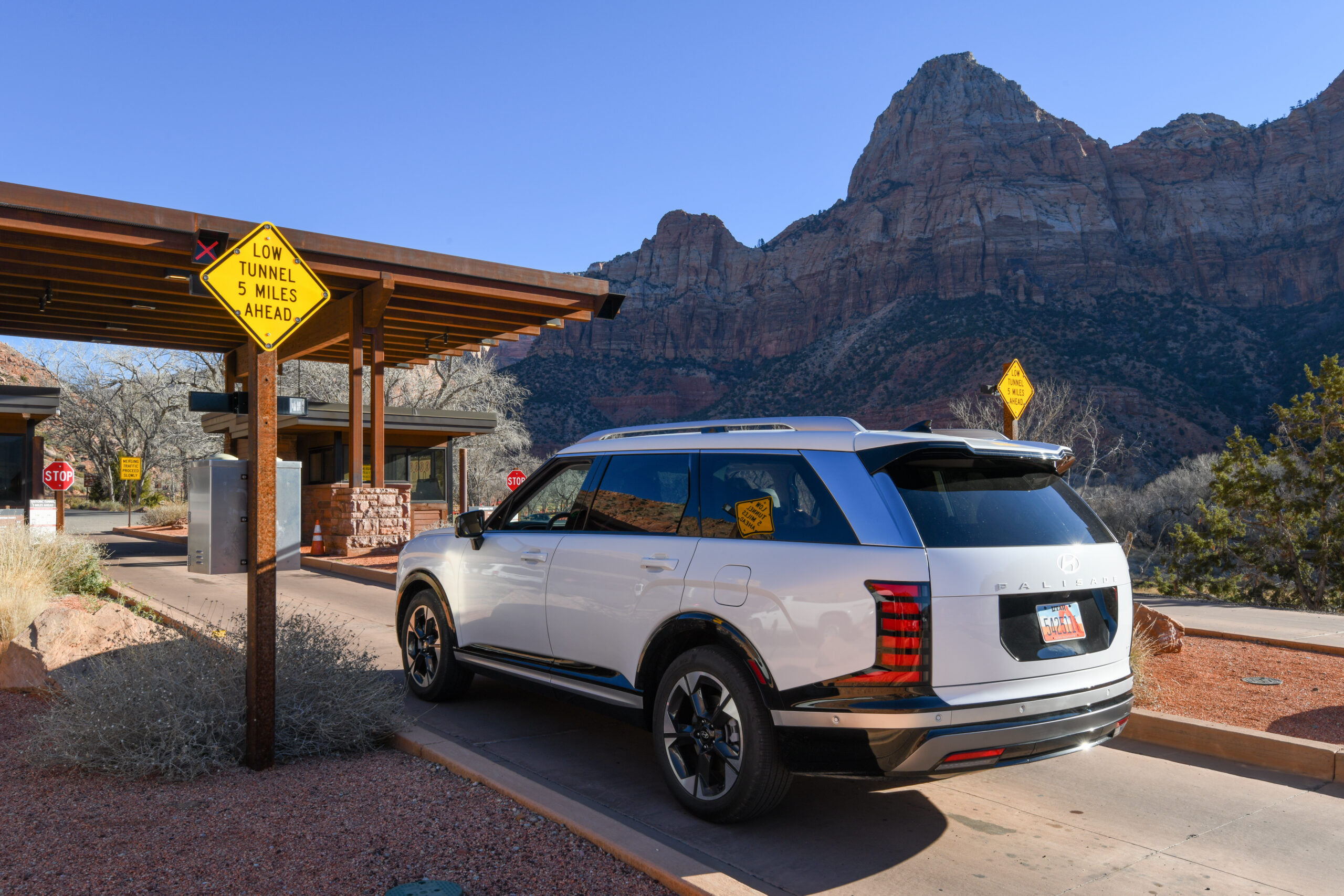 A group of hikers on the angels landing trail at zion national park.
